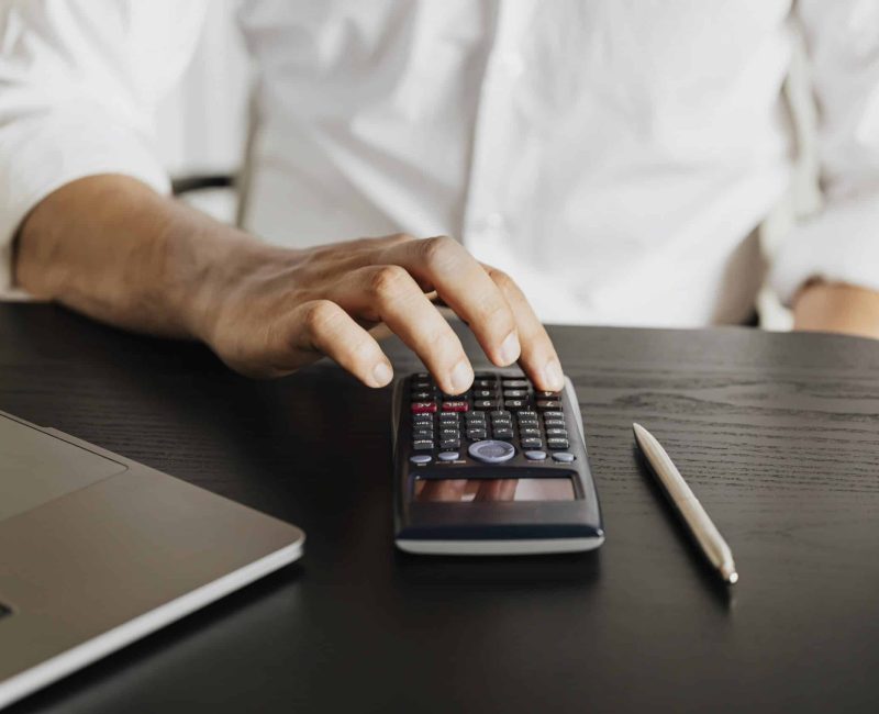 Man calculating his savings during the COVID-19 pandemic