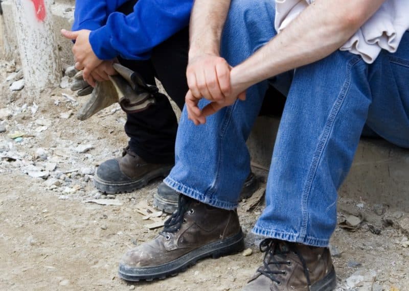 Construction workers waiting for work