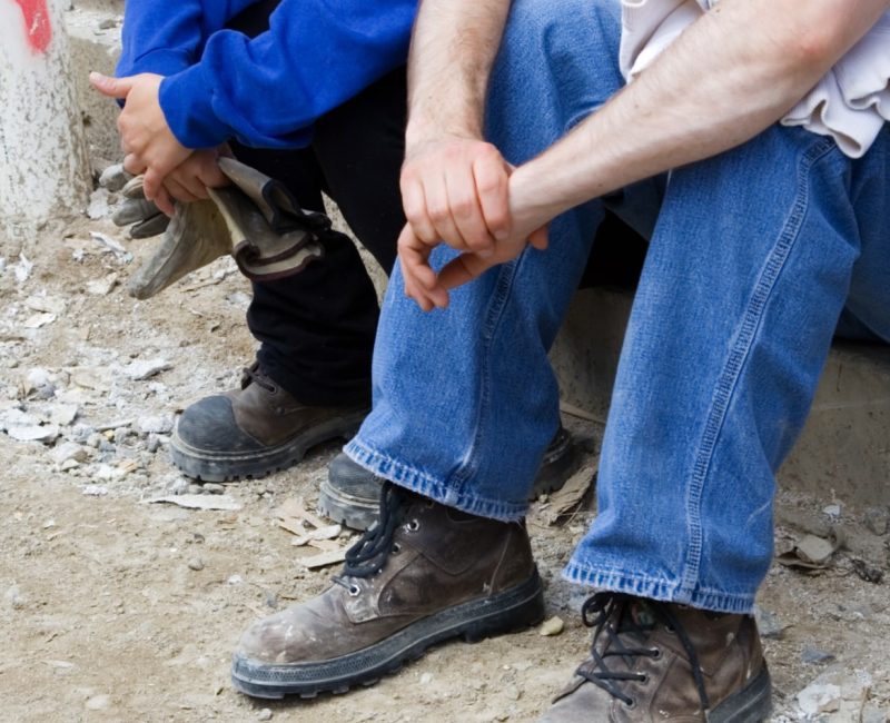 Construction workers waiting for work