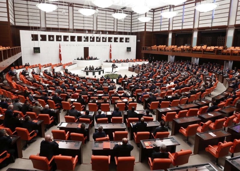 REFILE - CORRECTING GRAMMAR

Turkish Parliament convene for a debate in Ankara October 31, 2013. Four female lawmakers from Turkey's Islamist-rooted ruling party wore their Islamic head scarves in parliament on Thursday in a challenge to the country's secular tradition. AKP lawmakers Nurcan Dalbudak, Sevde Beyazit Kacar, Gulay Samanci and Gonul Bekin Sahkulubey attended the general assembly wearing their head scarves. The last time a lawmaker attempted to wear the head scarf in parliament in 1999 she was expelled from the assembly. REUTERS/Umit Bektas (TURKEY - Tags: POLITICS RELIGION)