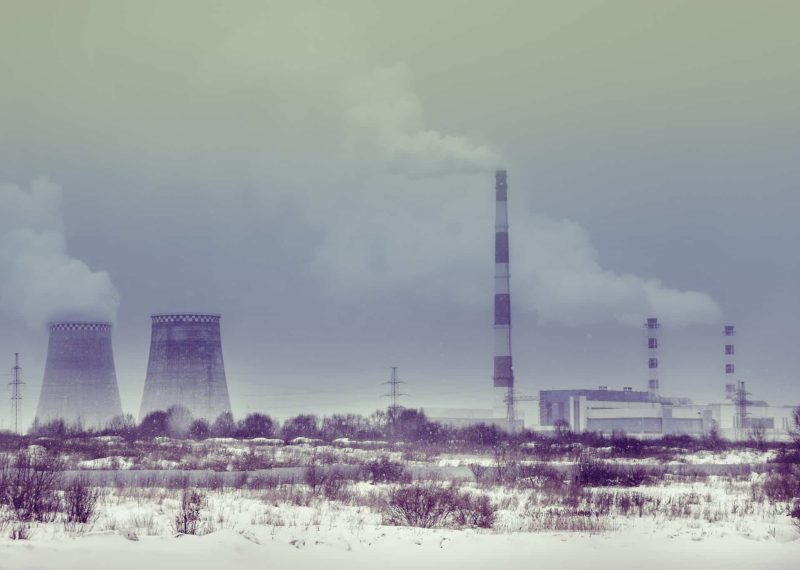 winter landscape with nuclear power plant